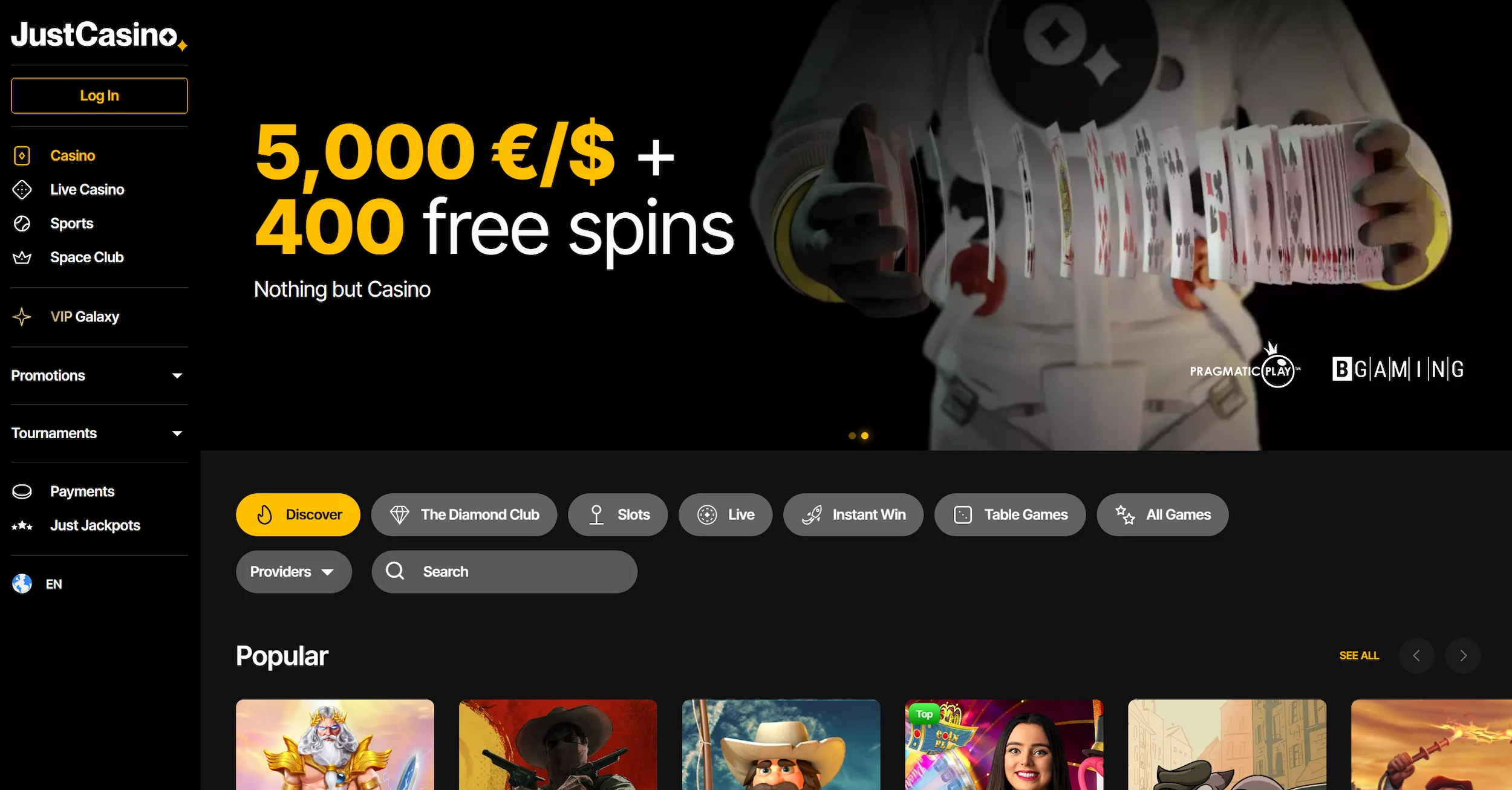 JustCasino frontpage featuring bonus offer, selection of online pokies and site navigation